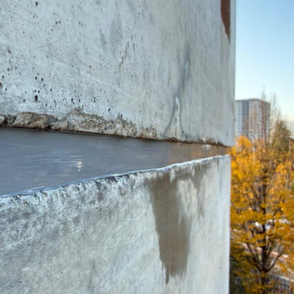 Close-up of the joint between two precast concrete wall panels
